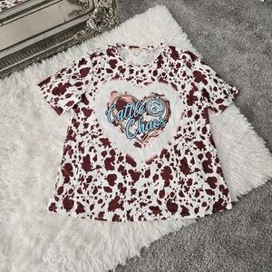 Southern Stitch "Cattle & Chaos" cow print top. Size XL. New.